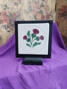 Handcrafted Ceramic Tile Art with Thistle Motif - White, Green & Purple